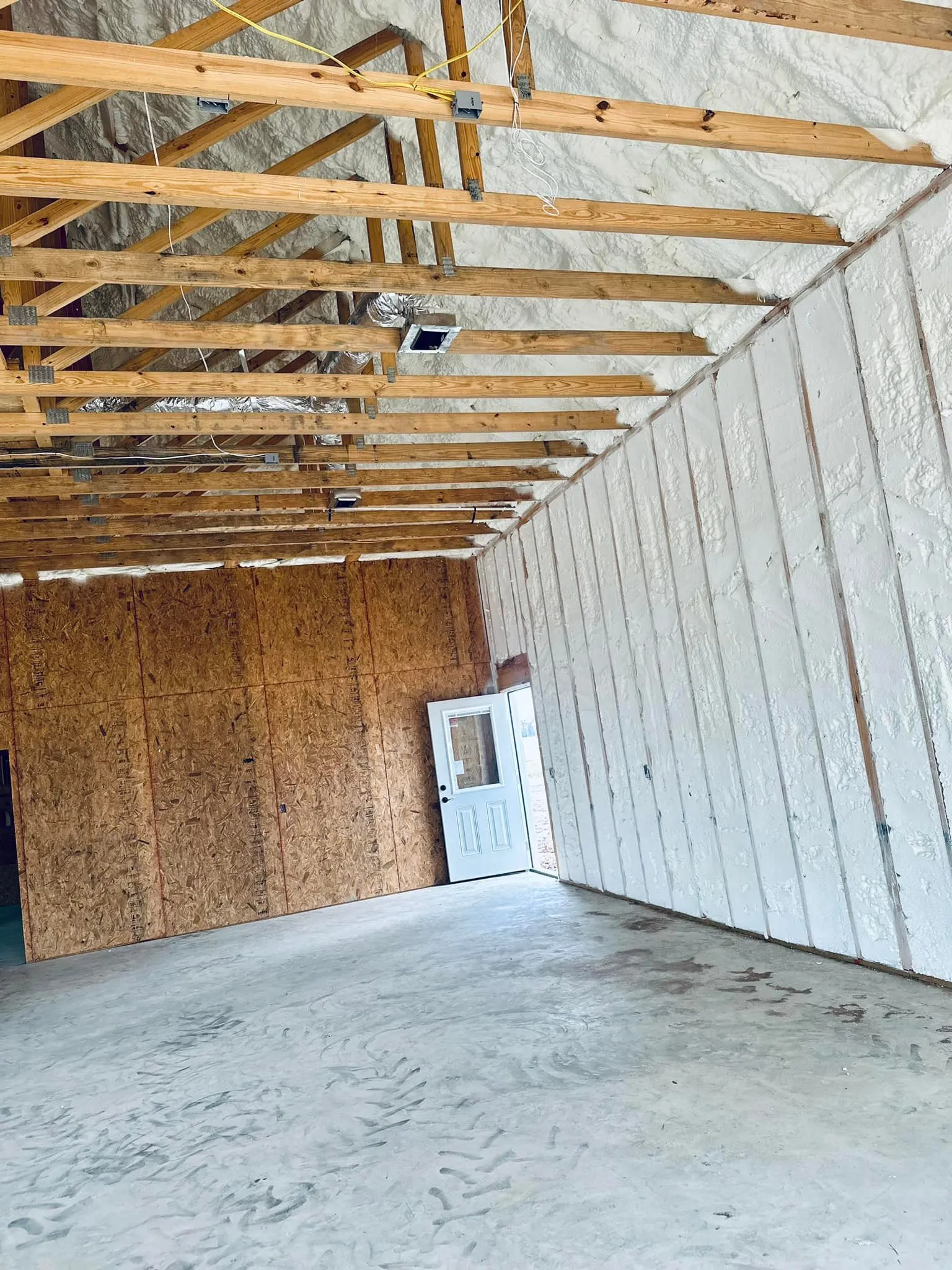 spray foam insulation to a building interior